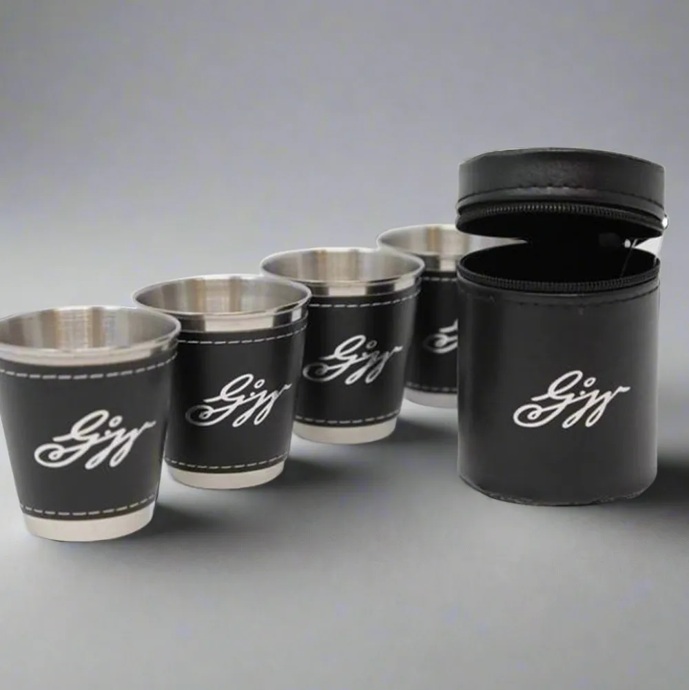 DESIGN MASTER ASSOCIATES Set of Four Stainless Steel and Leather Shot Glasses